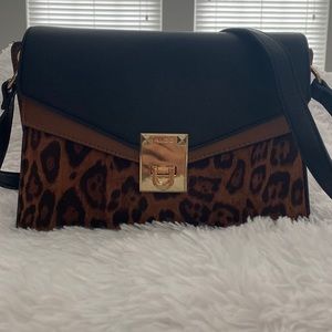 Leopard shoulder or crossbody purse.